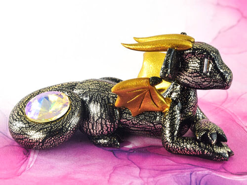 Black and champagne foil scaled dragon