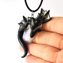 Load image into Gallery viewer, Black and silver wyvern necklace with silver dichroic glass focal