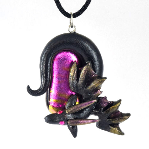 Black wyvern necklace with pink dichroic glass focal