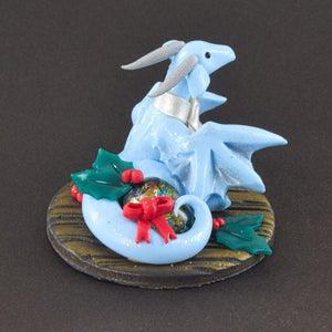 Tiny baby blue Christmas wyvern