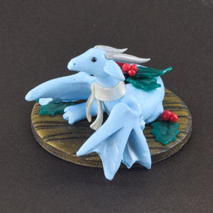 Tiny baby blue Christmas wyvern