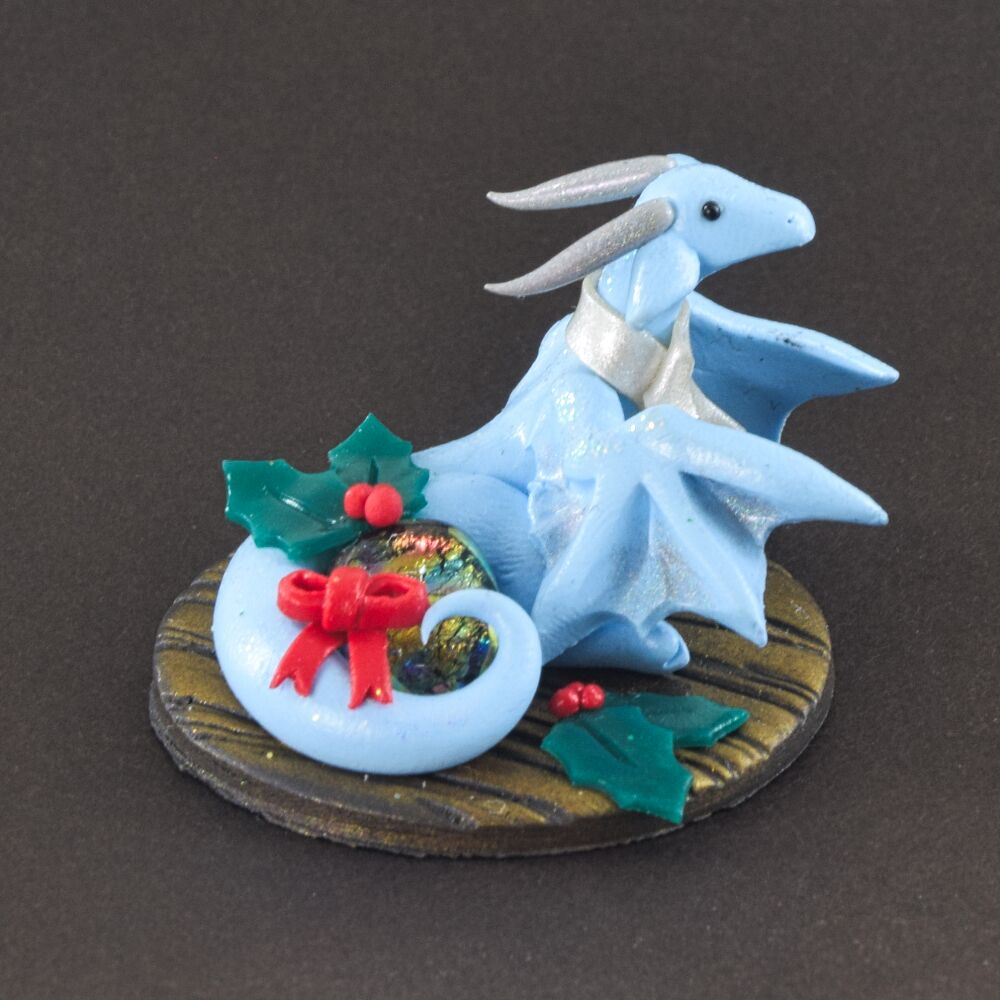 Tiny baby blue Christmas wyvern