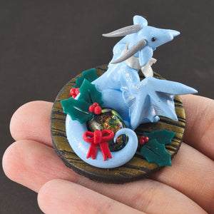 Tiny baby blue Christmas wyvern