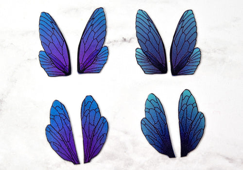 Blue dusted iridescent fairy wings