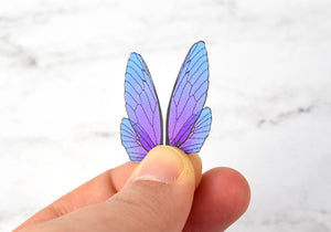 Blue dusted iridescent fairy wings