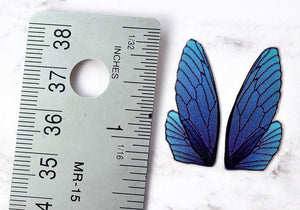 Blue dusted iridescent fairy wings