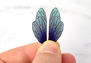 Blue dusted iridescent fairy wings