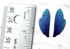 Blue dusted iridescent fairy wings