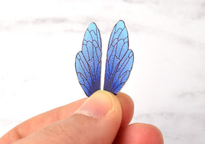 Blue dusted iridescent fairy wings